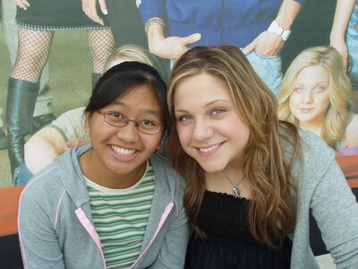 Lauren Collins at Richmond Centre Meet & Greet
[b]Lauren Collins[/b] (Paige Michalchuk) poses with a fan during the Degrassi Back to School Mall Tour at Richmond Centre in Vancouver, British Columbia on October 23, 2004.
[b]Photo credit: Jill[/b] — [url=https://www.flickr.com/photos/jill/]Flickr: Jill[/url]
Keywords: Lauren Collins;Paige Michalchuk;Richmond Centre;Vancouver;British Columbia;Degrassi;Degrassi Mall Tour;Meet and Greet;2004;fan photo