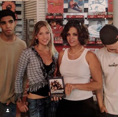 Aubrey Graham, Miriam McDonald, Melissa McIntyre & Shane Kippel – Season 1 DVD Box Set Signing at Sam Goody
Aubrey Graham, Miriam McDonald, Melissa McIntyre, and Shane Kippel pose with the Degrassi: The Next Generation Season 1 DVD box set during a signing event at Sam Goody in Universal City, California, USA, on October 2, 2004.
Keywords: Aubrey Graham;Miriam McDonald;Melissa McIntyre;Shane Kippel;Degrassi;The Next Generation;Season 1;DVD;Sam Goody;Universal City;California;2004;Signing;Cast Event