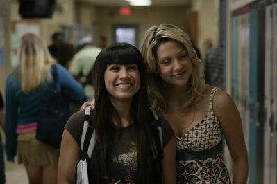 Manny Santos and Emma Nelson at Degrassi
Manny Santos (Cassie Steele) and Emma Nelson (Miriam McDonald) smile together in the hallway at Degrassi Community School.
Keywords: Cassie Steele;Miriam McDonald;Manny Santos;Emma Nelson;Degrassi;Degrassi The Next Generation;Rock This Town;Season 6;episode promotional photograph;Degrassi Community School;school hallway
