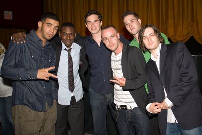 Cast and Guests at the “Us & Them” & “Mookie’s Law” Premiere – August 23, 2008
Aubrey Graham, Mazin Elsadig and other guests pose together at the “Us & Them” and “Mookie’s Law” premiere at the Bloor Cinema in Toronto on August 23, 2008.
Keywords: Aubrey Graham;Mazin Elsadig;Us & Them;Mookie's Law;Bloor Cinema;Toronto;2008