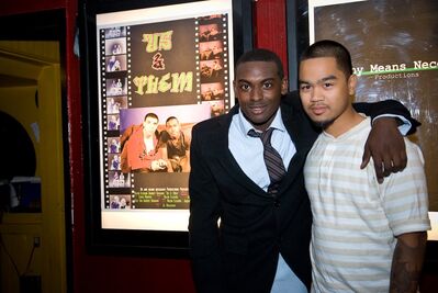 Mazin Elsadig and Guest at the “Us & Them” Premiere – August 23, 2008
Mazin Elsadig poses with a guest beside promotional artwork for “Us & Them” during the “Us & Them” and “Mookie’s Law” premiere at the Bloor Cinema in Toronto on August 23, 2008.
Keywords: Mazin Elsadig;Us & Them;Mookie's Law;Bloor Cinema;Toronto;2008